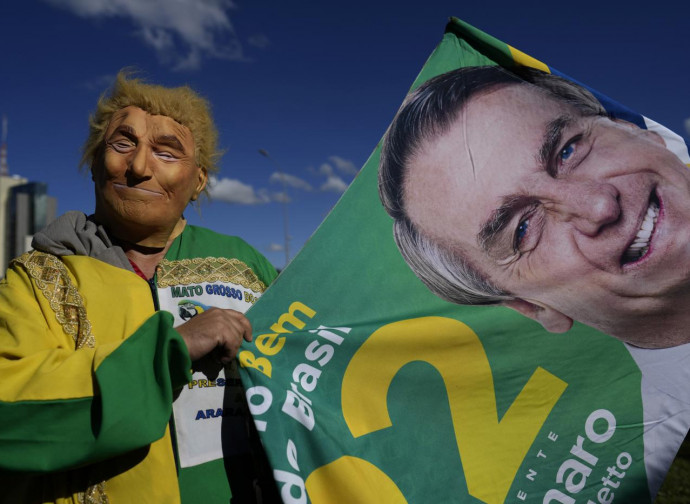 Manifestazione in Brasile: un fan di Trump e Bolsonaro (La Presse) Manifestazione in Brasile: un fan di Trump e Bolsonaro (La Presse)