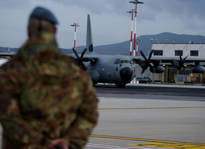 Il ritorno in Italia dei soldati feriti in Iraq Il ritorno in Italia dei soldati feriti in Iraq