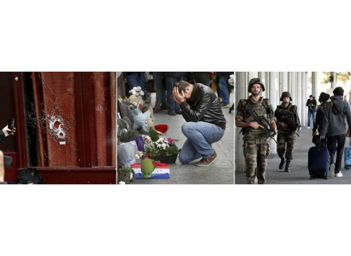 Il locale a Parigi assaltato dai terroristi, i fiori dopo la strage, l'esercito nelle strade