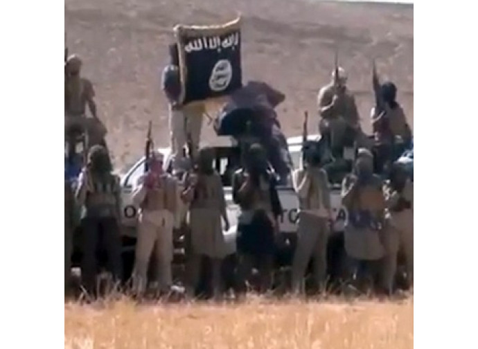 L'Isil festeggia la vittoria L'Isil festeggia la vittoria