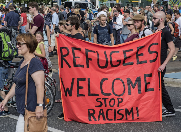 "Benvenuti rifugiati"