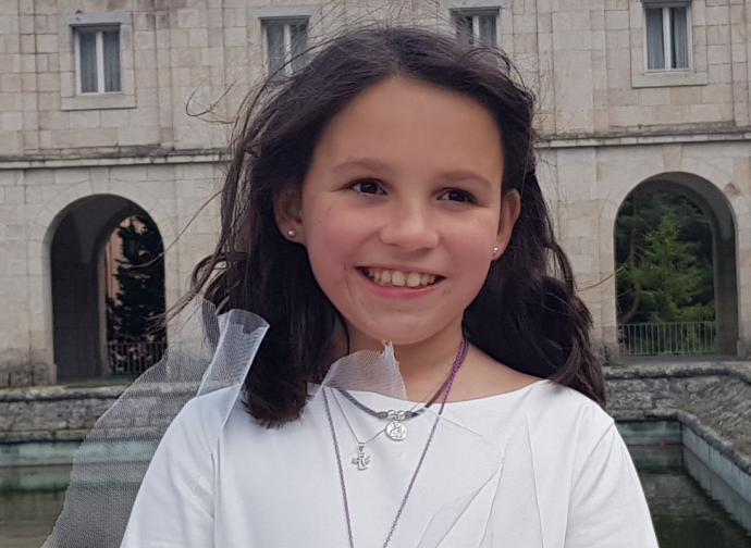 Teresita nel giorno della sua Prima Comunione (foto dalla madre adottiva)