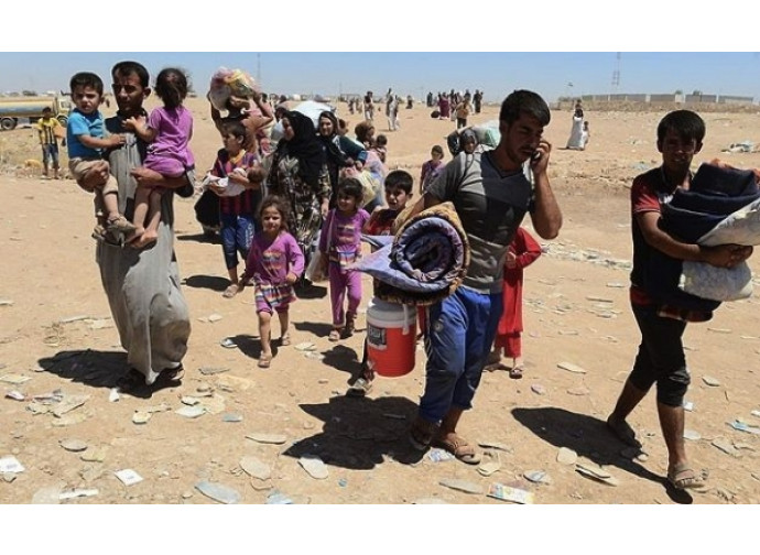 Yezidi in fuga dall'Iraq Yezidi in fuga dall'Iraq